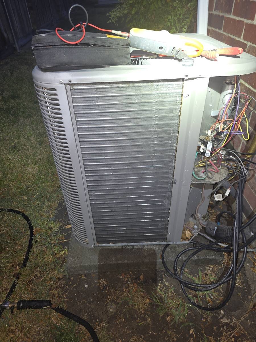 Clean condenser coil after professional AC maintenance in Richardson, TX